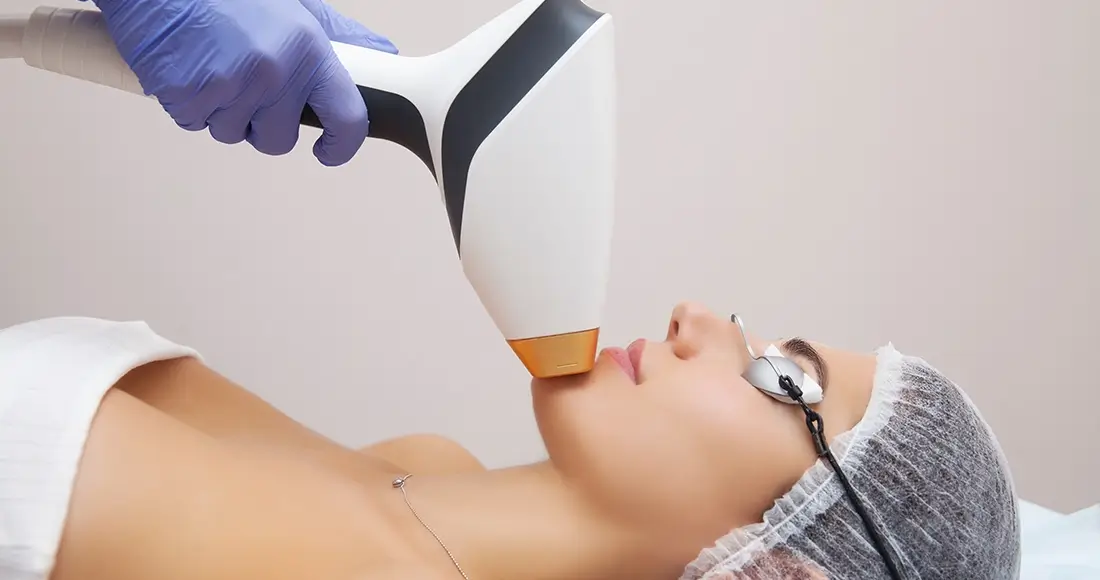 IPL hair removal. Anti aging procedures skin care concept woman receiving facial beauty treatment removing pigmentation